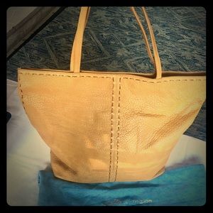 Carlos Falchi leather boeheimen catch all tote.